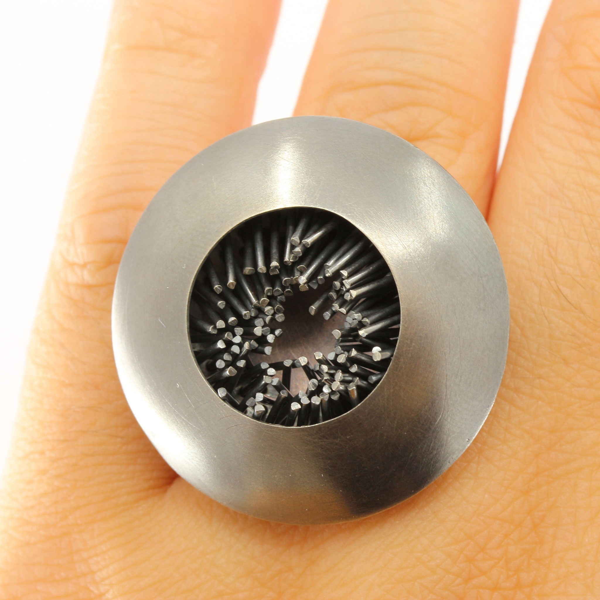 Circular Framed H.n6 Oxidised Silver Ring